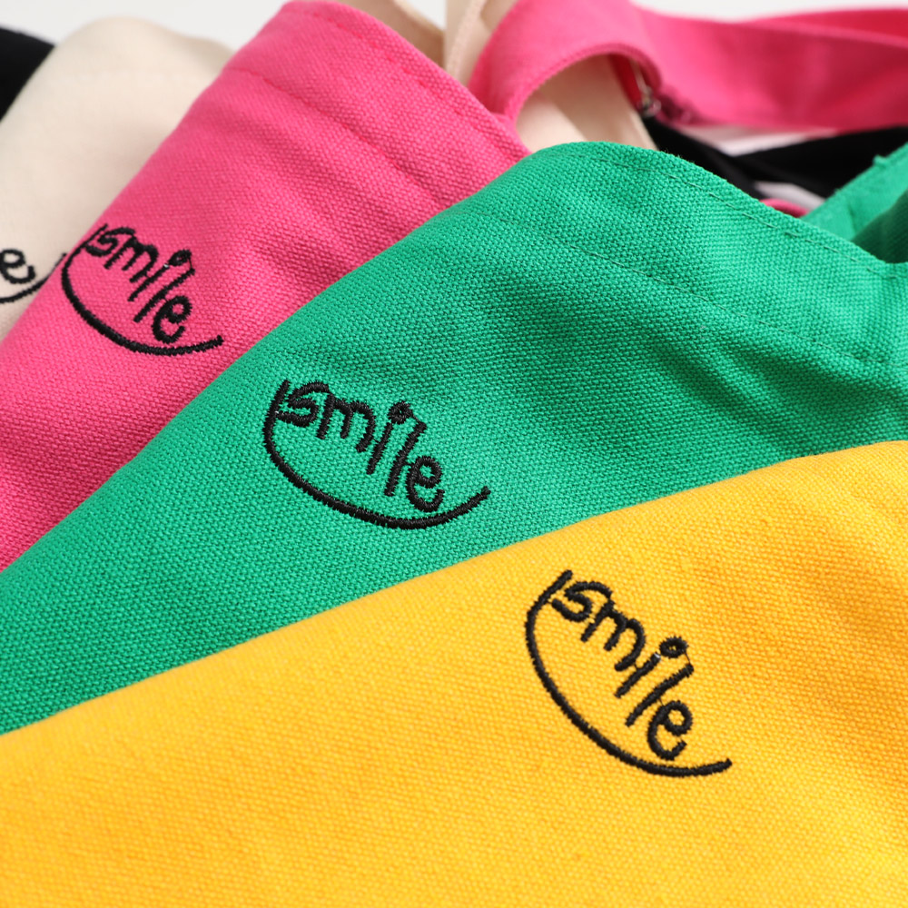 SMILE embroidered crossbody bag